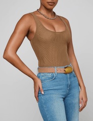 Model wearing L’AGENCE Kalea semi-sheer mesh bodysuit in dark macchiato