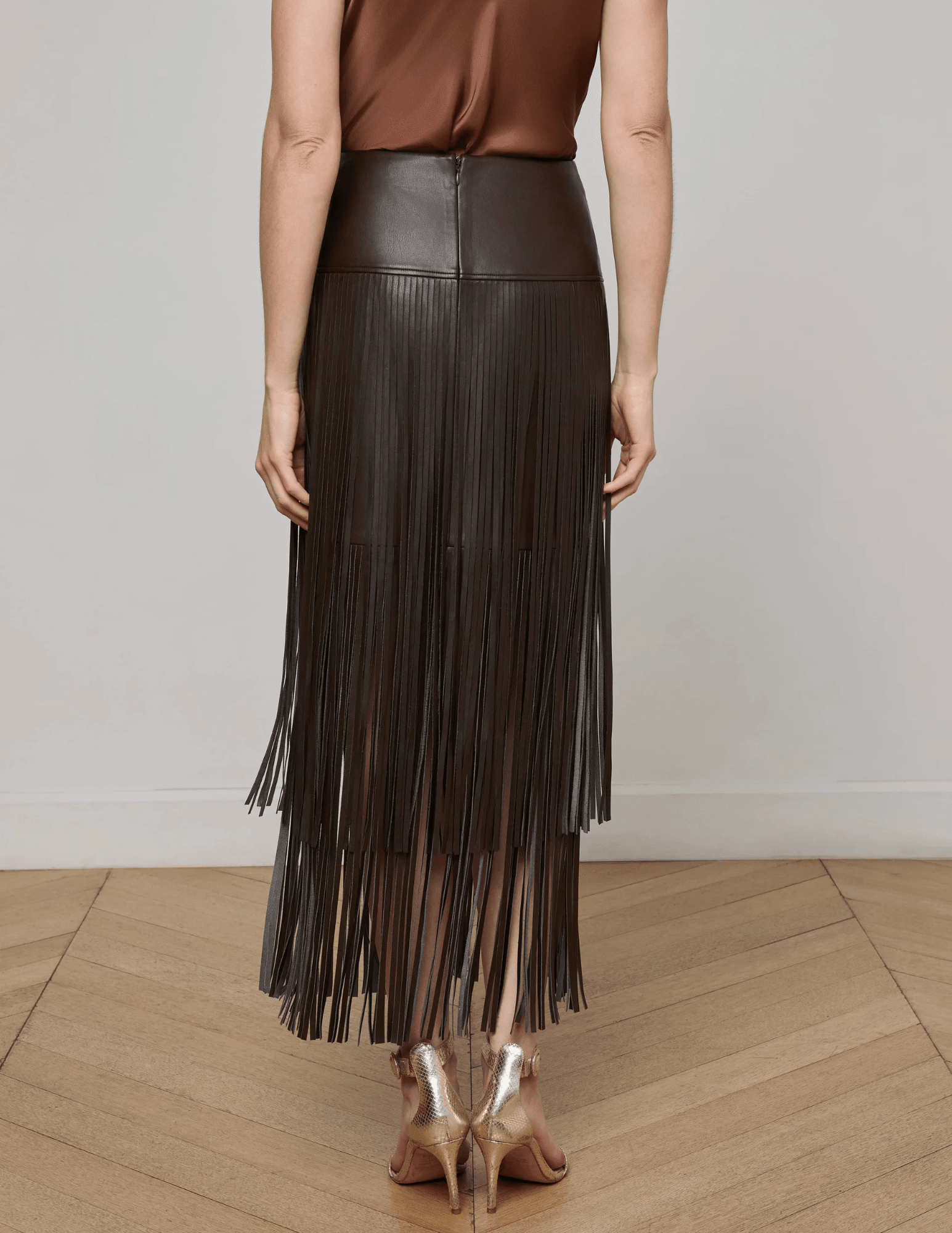 L’Agence Karolina Vegan Leather Fringe Midi Skirt in coffee bean brown with tiered fringe back view
