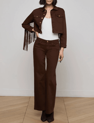 Front view of L’AGENCE Koda cropped denim jacket in brown with fringe and gold rivet buttons