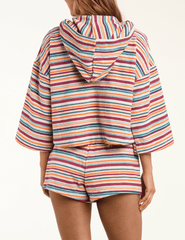 Back view of L’AGENCE Lee terry cropped hooded poncho in multicolor watercolor stripe
