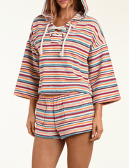 Side view of L’AGENCE Lee terry cropped hooded poncho in multicolor watercolor stripe
