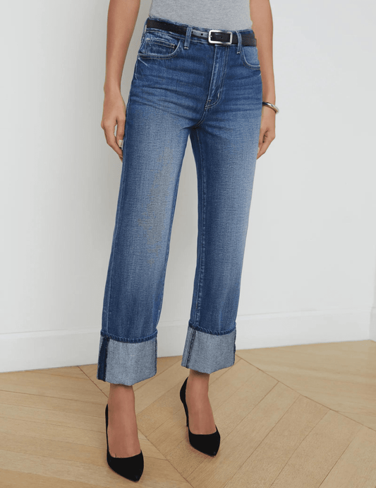 L'AGENCE Leighton cuffed stovepipe jeans in Arco wash, women’s denim with a tapered fit, cuffed hems, and classic mid-blue tone front model view