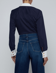 Back view of L’AGENCE Leslie bodysuit styled with denim