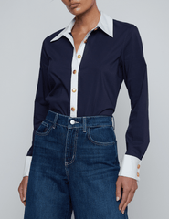 Front view of L’AGENCE Leslie bodysuit styled with denim