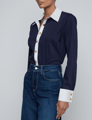 Side view of L’AGENCE Leslie bodysuit styled with denim