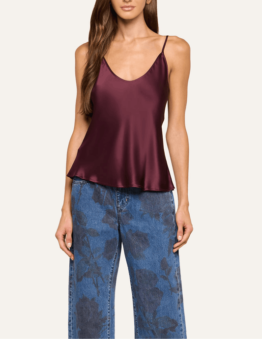 Front view of L'AGENCE Lexi silk camisole in Deep Sangria showing the elegant V-neck and delicate adjustable straps.