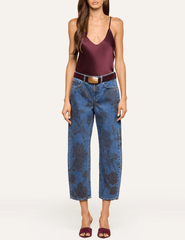 L'AGENCE Lexi Deep Sangria silk camisole styled with blue patterned jeans for a sophisticated casual outfit.
