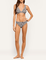 L'AGENCE Lexie Triangle Bikini Top styled with matching zebra print bikini bottoms.
