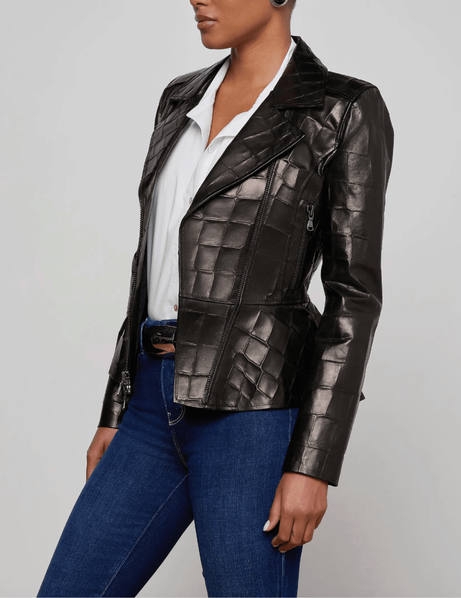 Model wearing L’AGENCE black croc-embossed leather jacket – side