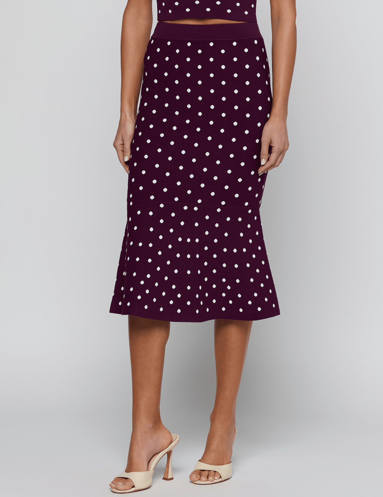 L'AGENCE Mae Knit Flare Skirt in Plum Ivory Polka Dot front view