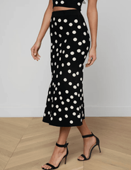 Side  view L'Agence Mae knit midi skirt in black ecru polka dot