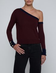 Front view of L’AGENCE Maeva One Shoulder Color-Block Sweater in Malbec and Midnight