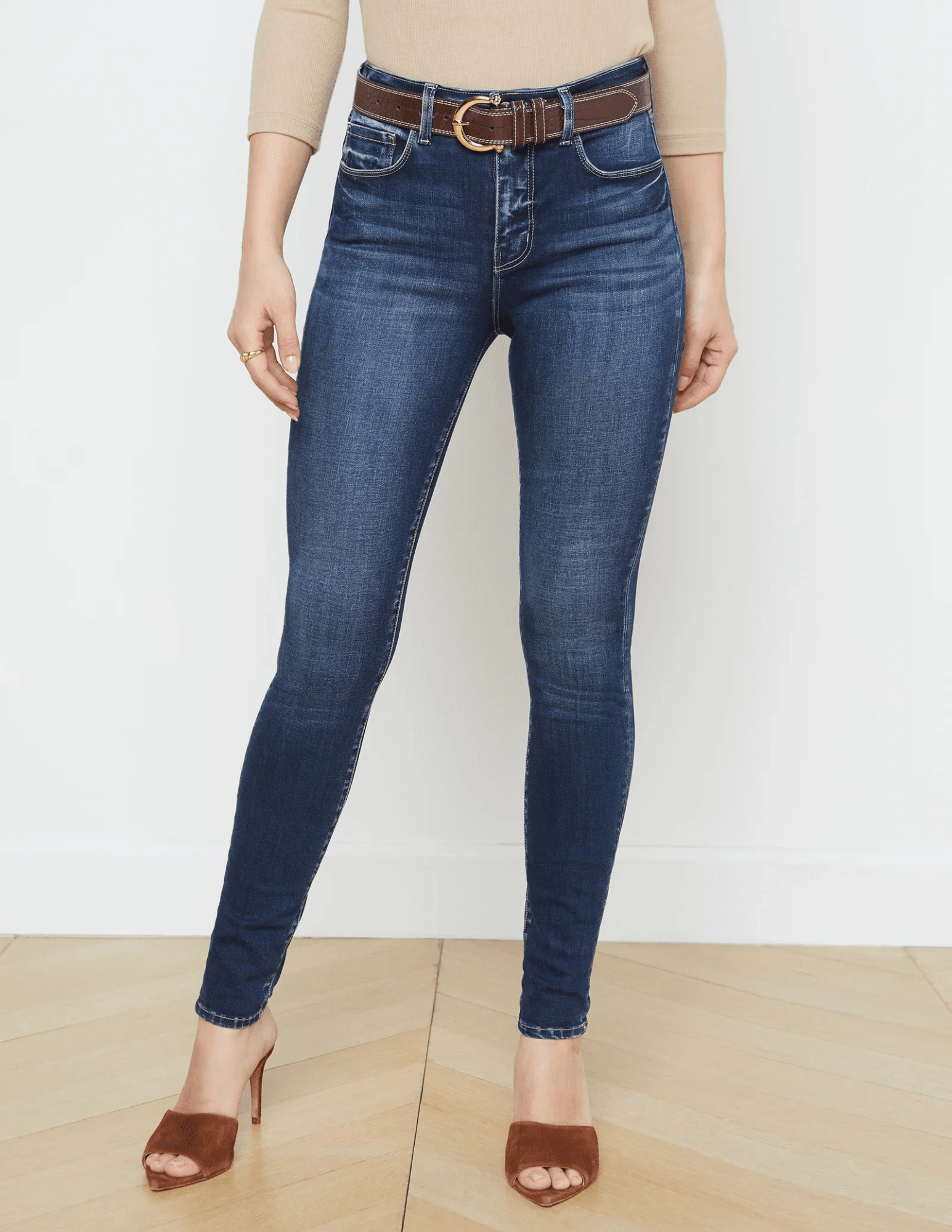 Model wearing L’Agence Marguerite High-Rise Skinny Jeans Columbia – dark wash, premium stretch skinny jeans