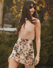 L’AGENCE Marseille floral tapestry mini skirt styled for an elevated look