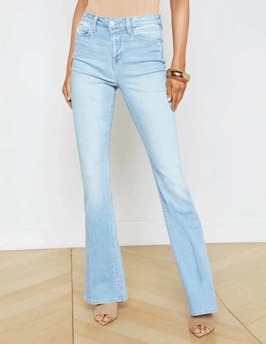 Model wearing L’Agence Marty Ultra High-Rise Flared Jean Bonham – light blue flared jeans for women, ultra high waist