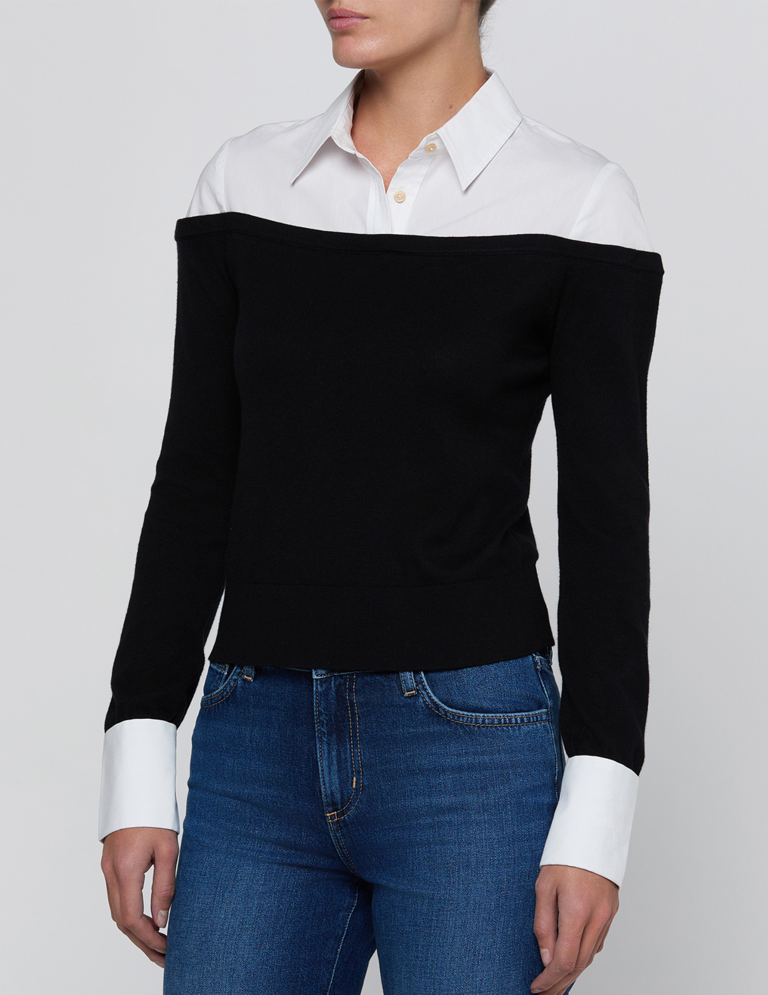 Side view of L’AGENCE Mathilde Poplin Combo Sweater in Black & White