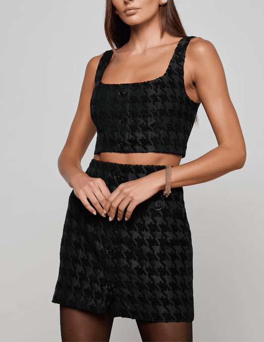 Front view of L’AGENCE Maylin Bralette Top featuring exposed zipper and cropped silhouette.