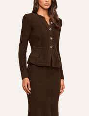 Side view of L'AGENCE Melissa Knit Flare Cardigan in Dark Brown showing its fitted silhouette and flared hem.