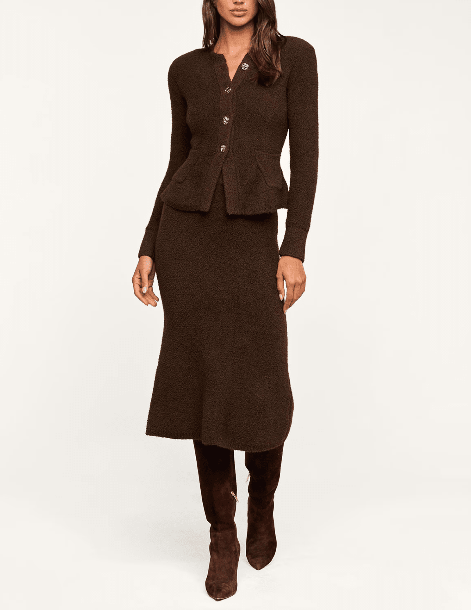 Model wearing L'AGENCE Melissa Dark Brown Gold Cardigan with a fitted waist, structured shoulders and matching brown skirt.