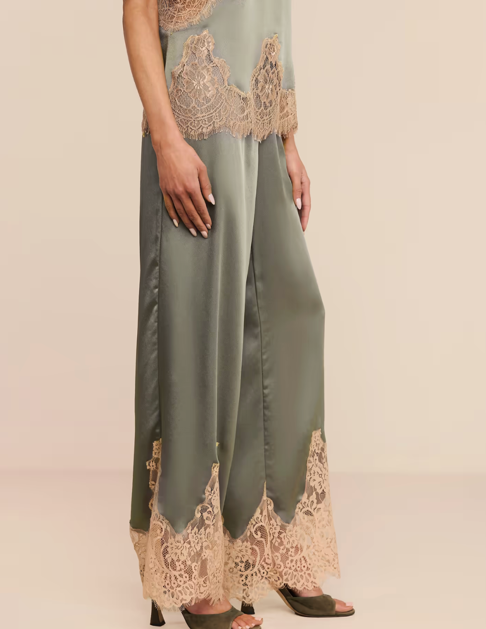 Side view of L'AGENCE Mirel satin pants with praline lace trim