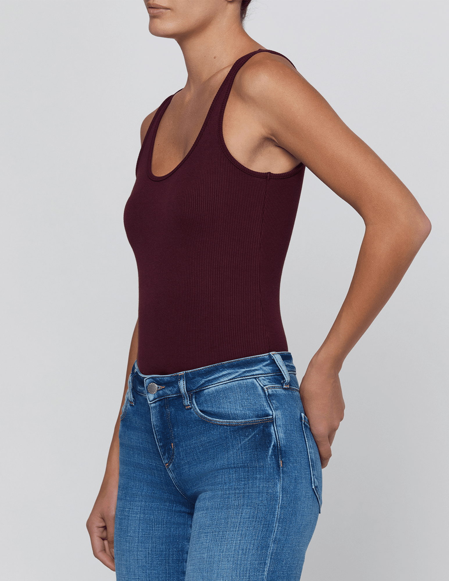 Side view of L'AGENCE Nica Scoop Neck Bodysuit in Deep Sangria