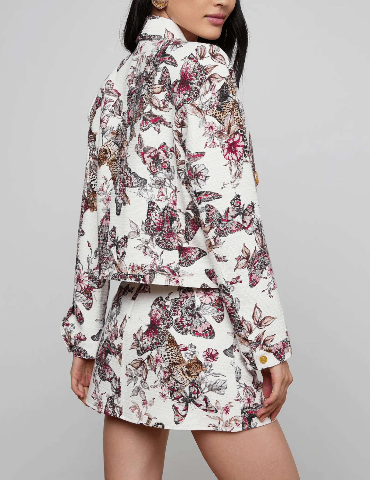Back view of L’AGENCE Nyx cropped jacket in butterfly jungle print