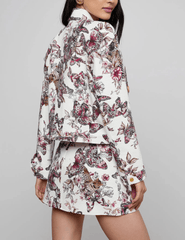 Back view of L’AGENCE Nyx cropped jacket in butterfly jungle print