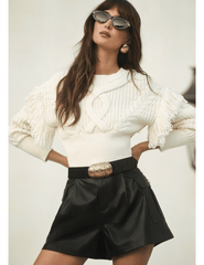 Eidtorial image of L’AGENCE Ottavia Lace Back Pullover in ivory with clairmont vegan shorts