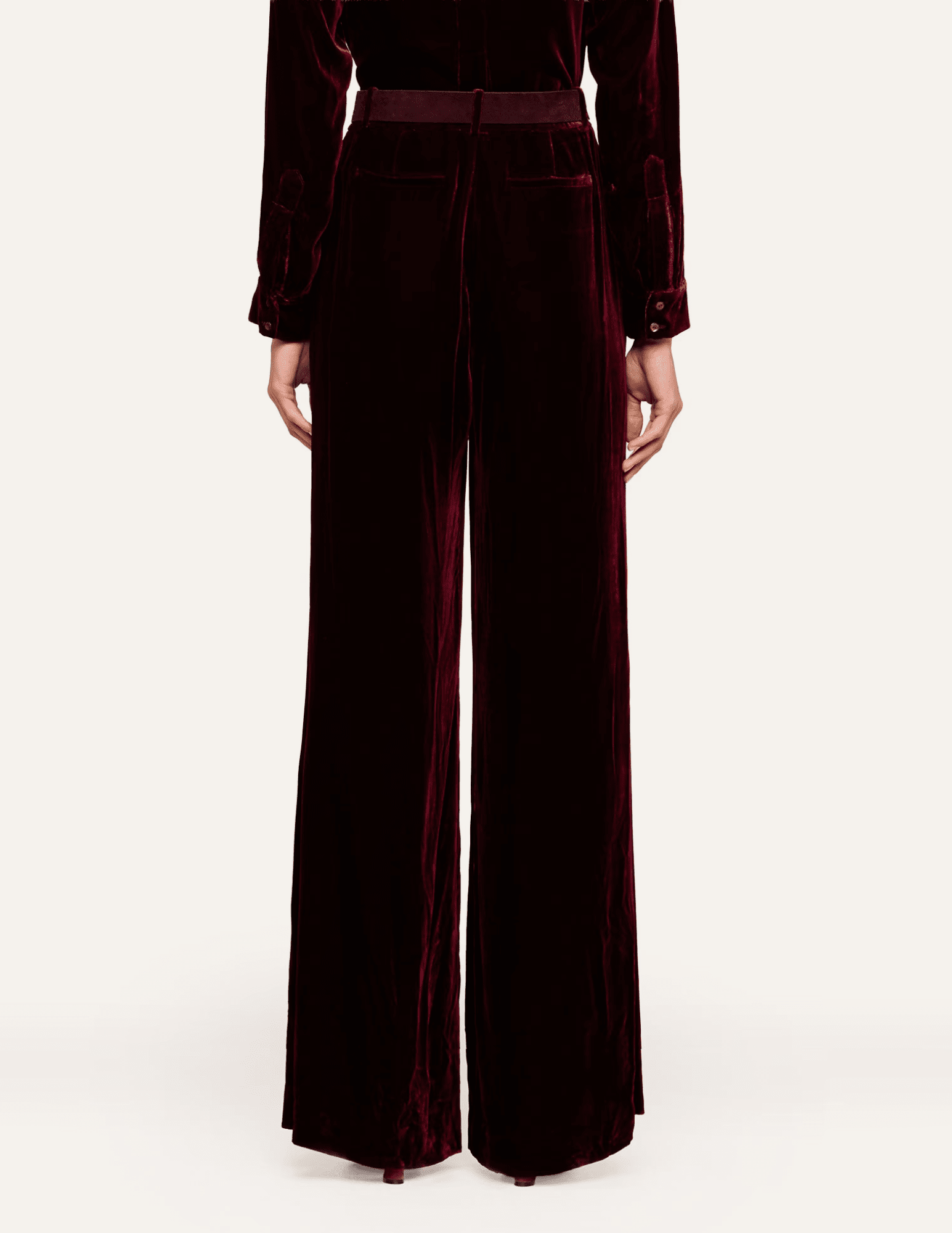 Back view of L'AGENCE Pilar Velvet Wide Leg Pants in Deep Port featuring a tailored waistband and wide-leg cut.