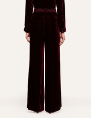 Back view of L'AGENCE Pilar Velvet Wide Leg Pants in Deep Port featuring a tailored waistband and wide-leg cut.