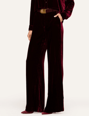 Side view of L'AGENCE Pilar Velvet Wide Leg Pants in Deep Port featuring a tailored waistband and wide-leg cut.