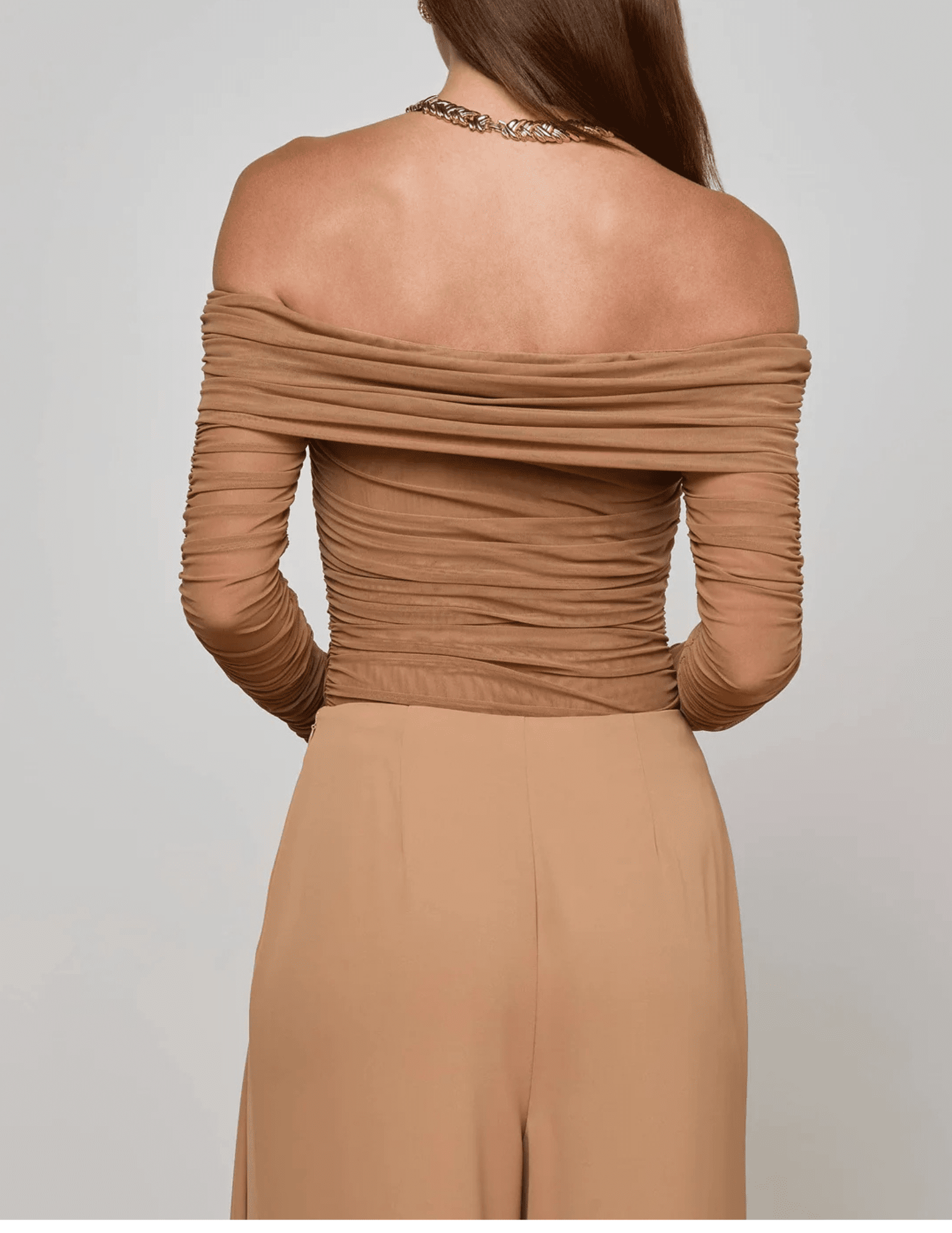 Back view of Cinnamon Swirl off-shoulder long sleeve bodysuit by L’AGENCE