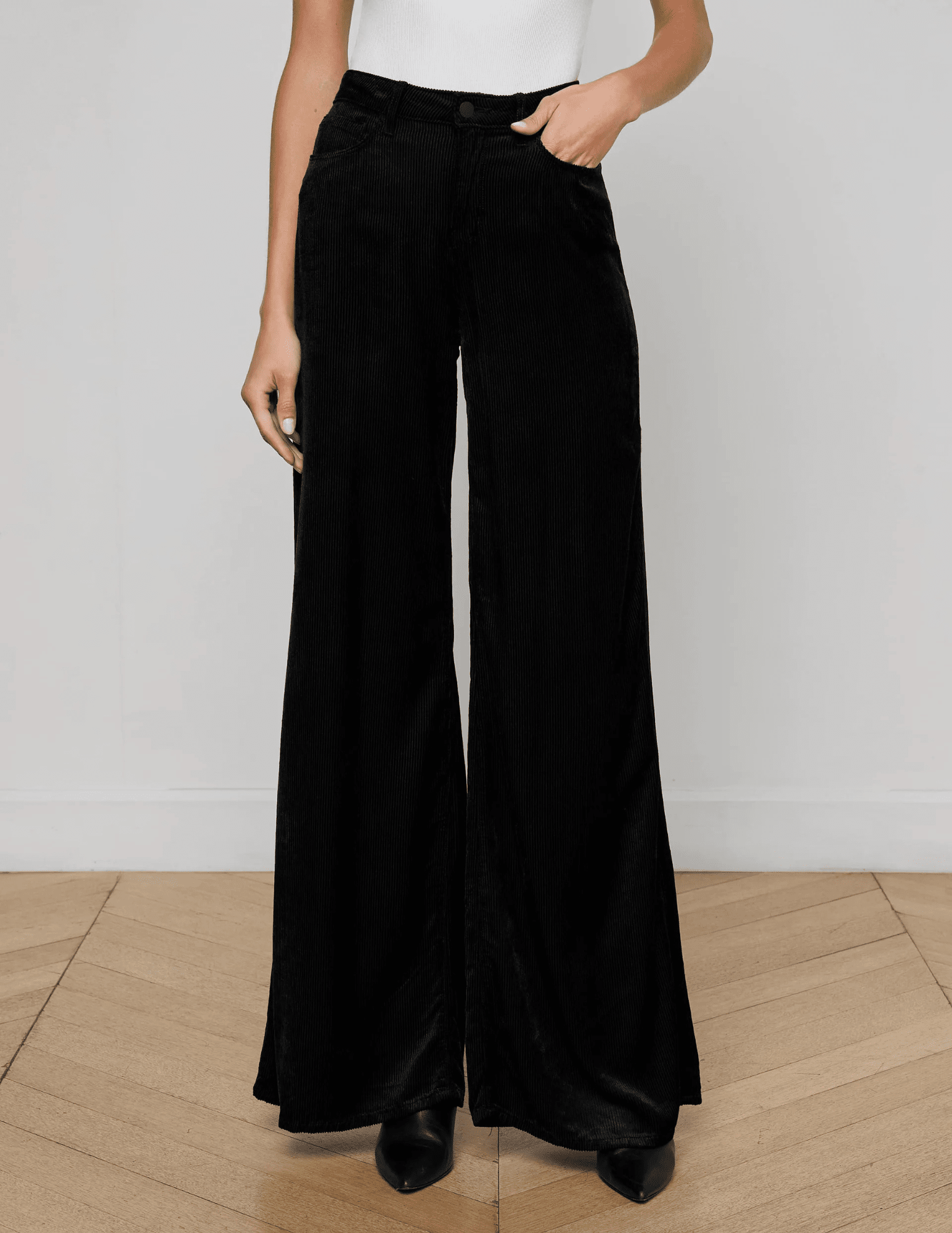 L’AGENCE Quincy High Rise Ultra Wide Leg Corduroy Jeans in Black, front view.