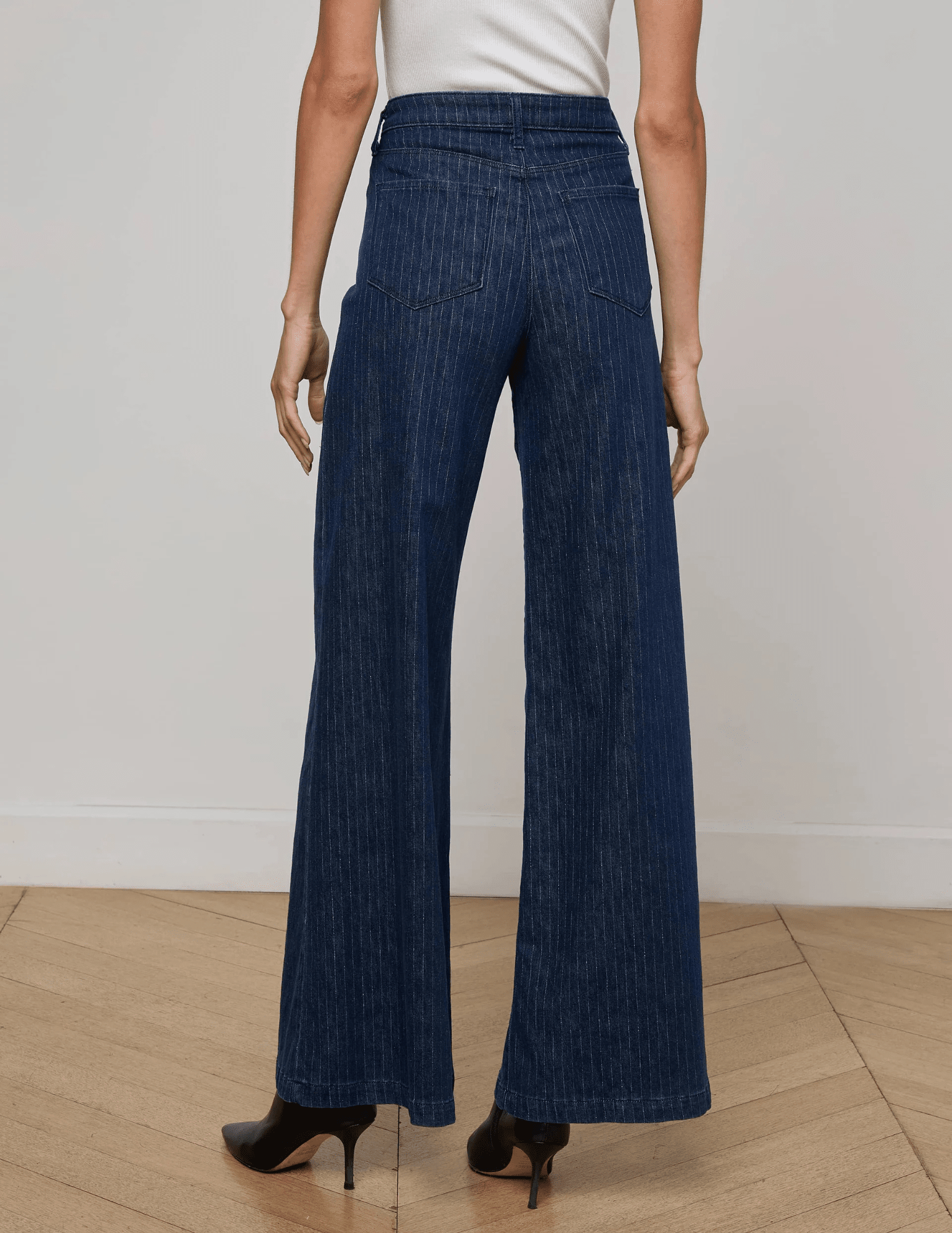 Back view showcasing the tailored pockets and ultra-wide leg cut