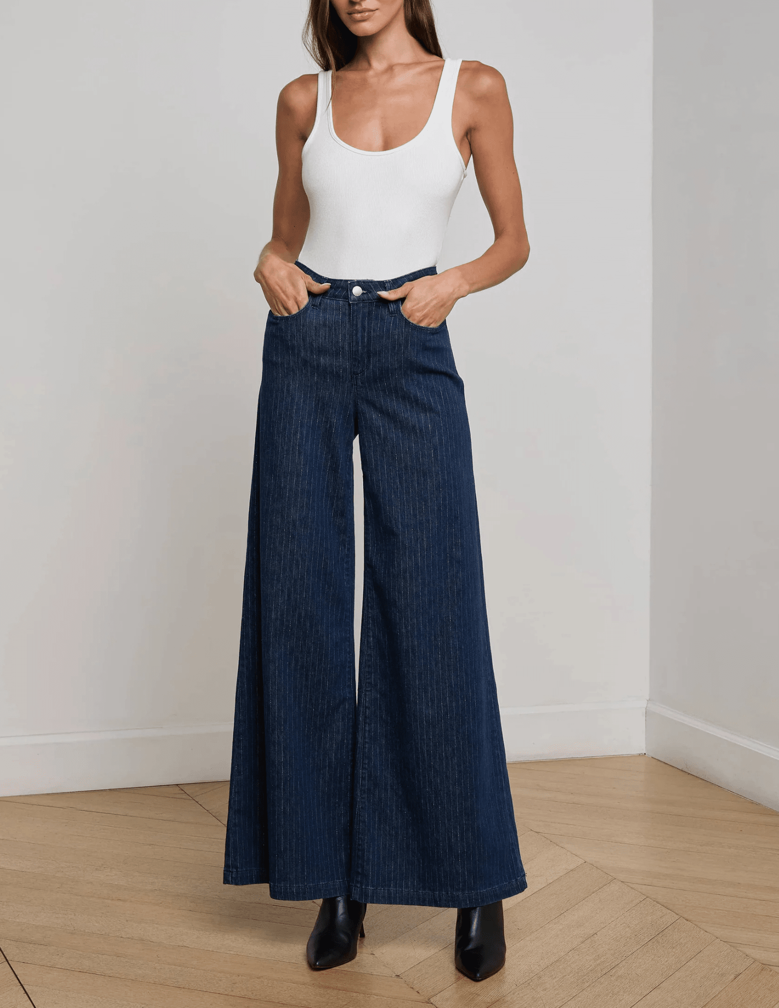 Full-body outfit styled with Quincy Jeans and tucked-in top