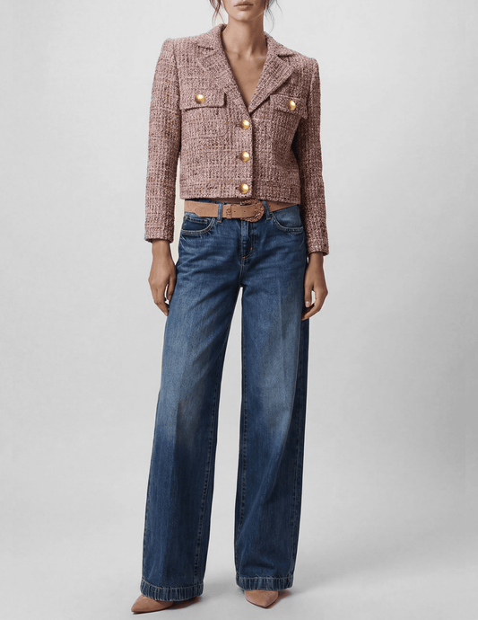Model wearing L'AGENCE Quinn Bordeaux Multi Tweed Jacket with wide-leg denim.