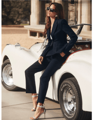 View of L’AGENCE Rebel trouser in midnight ivory pinstripe with high-waisted fit