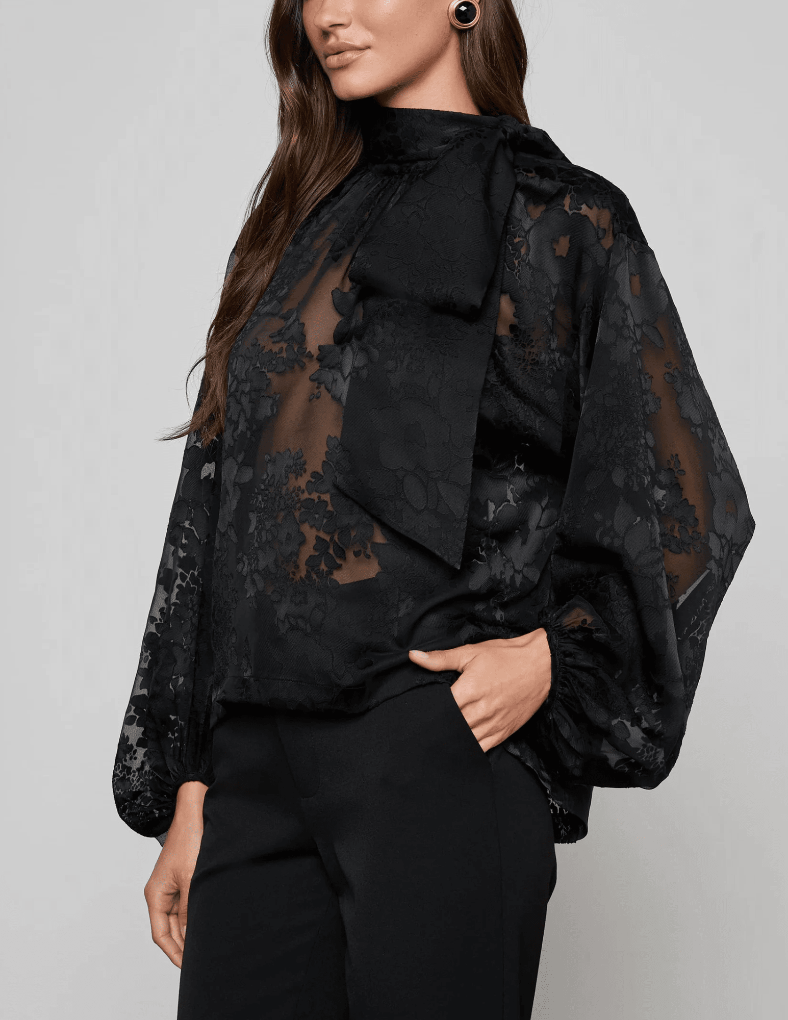 L’AGENCE Rhett Oversized Blouse in black with mock neckline and blouson sleeves