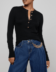 Front view of L’AGENCE Ronda long sleeve knit henley top in black