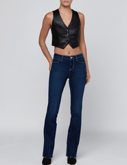 L'AGENCE Ruth Straight Leg Jeans in Robles styled with a black sleeveless leather vest and heels for a chic denim outfit.