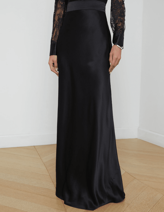 Front view of long black silk maxi skirt by L’AGENCE