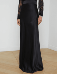 Front view of long black silk maxi skirt by L’AGENCE