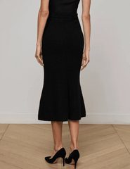 L’Agence Salem Knit Flare Midi Skirt in black with high-rise fit and flared hem back view