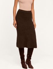 Side view of L'AGENCE Salem Knit Flare Midi Skirt in Dark Brown showing its elegant textured knit