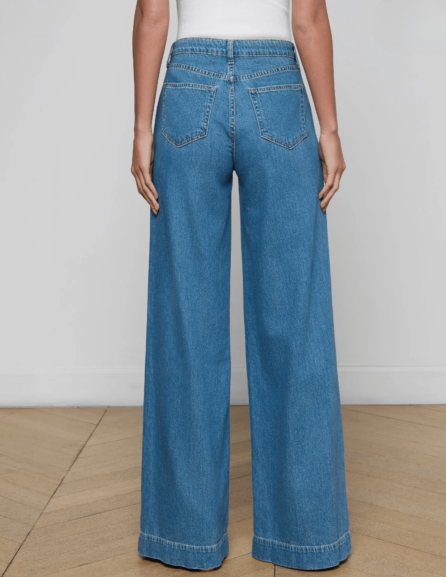Back view of L’AGENCE Sandy wide leg jeans with contoured waistband