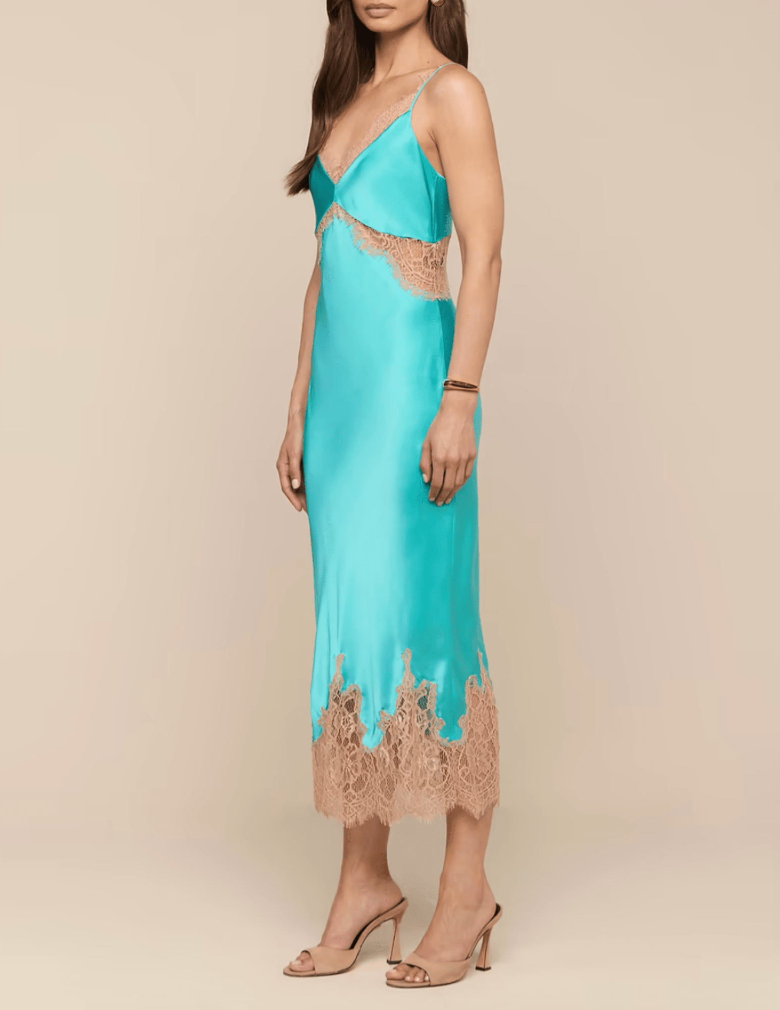 Side view ofL'AGENCE Scotly silk slip dress in cyan with cappuccino lace trim