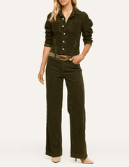 L'AGENCE Scottie Corduroy Wide Leg Jeans in Army styled with a coordinating olive-green jacket, gold belt, and neutral shoes.
