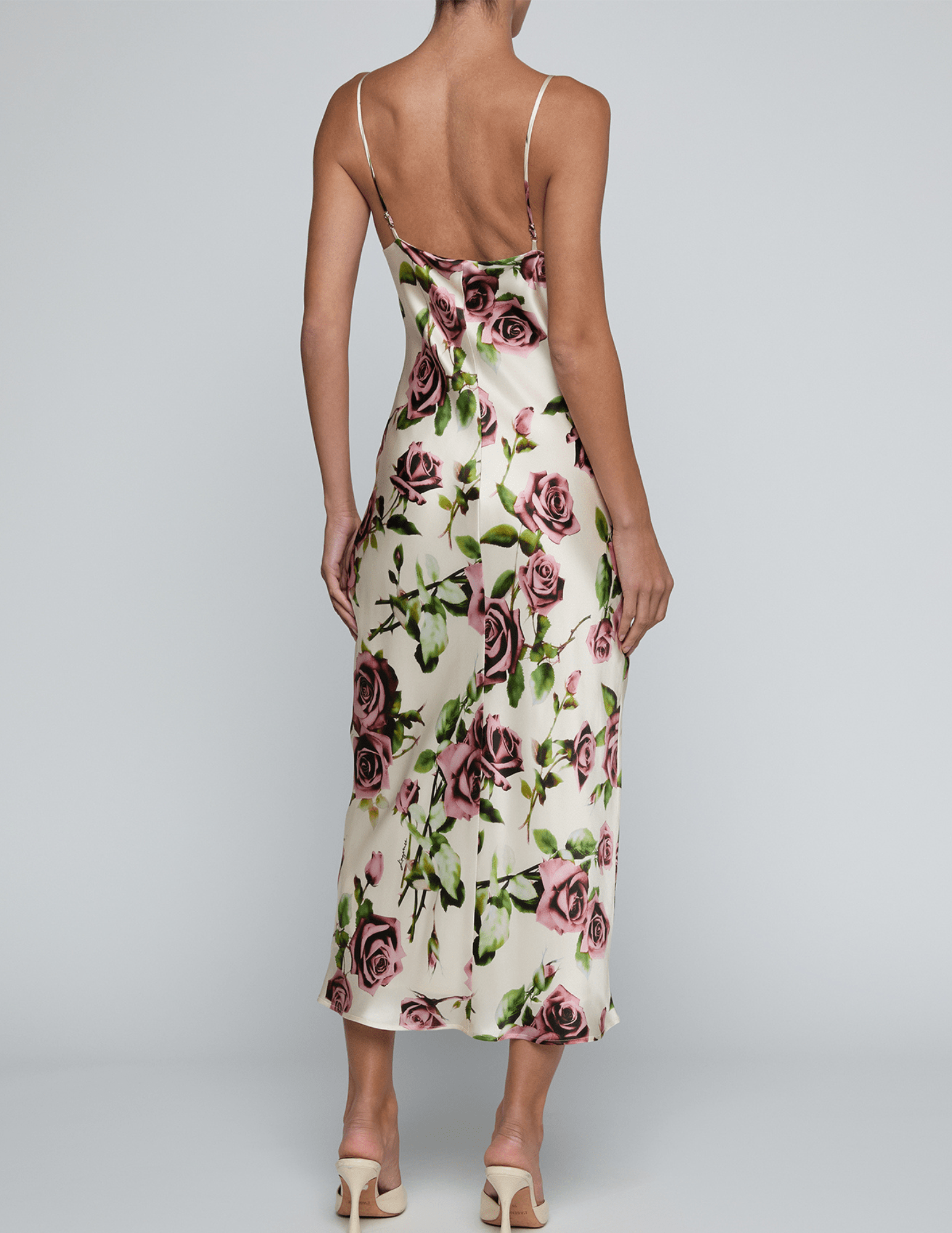 Back view of L'AGENCE Seridie silk midi slip dress in romantic rose print