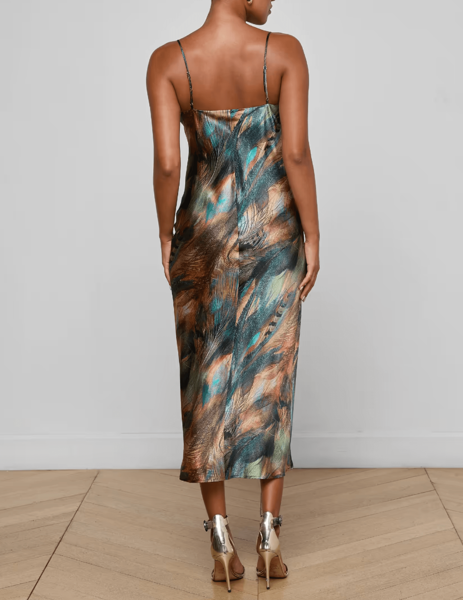 Back view of L’AGENCE Seridie Silk Slip Dress in Teal Multi Mix Feather Print