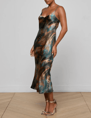 Side view of L’AGENCE Seridie Silk Slip Dress in Teal Multi Mix Feather Print